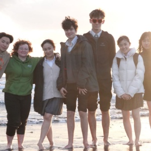 Stephen Perse and Keio students on the beach in Japan as part of the exchange programme